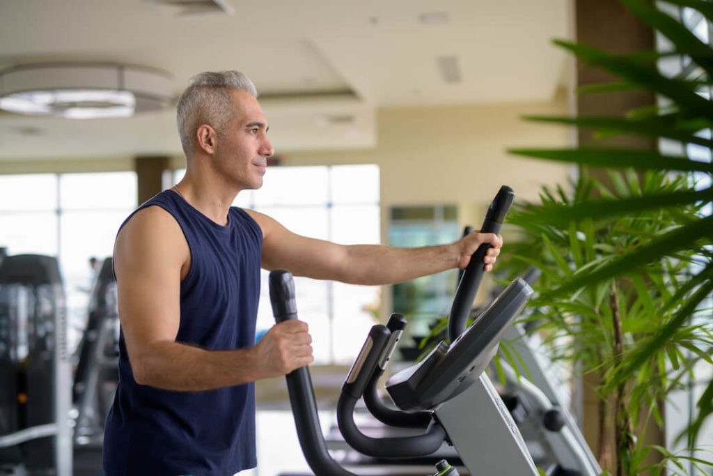 men's sports over 40 - treadmill training exercise at gym