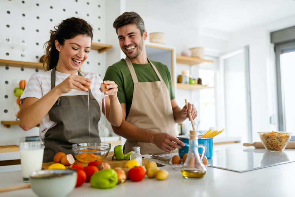 14 Foods That Makes You Taller - Tall Couple Cooking Healthy Foods