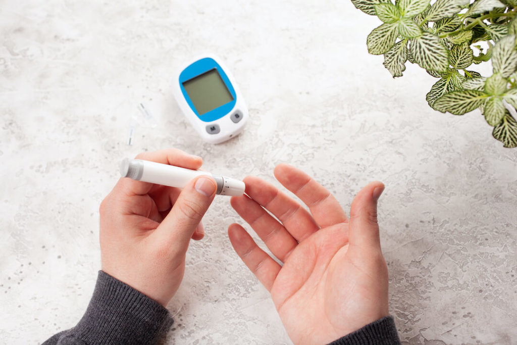 Erectile Dysfunction from Diabetes - Man Checking His Blood Sugar Levels